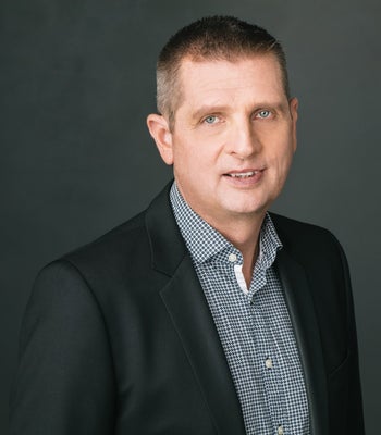 Portrait of Rick Clarke, Real Estate Consultant.